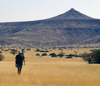 Paul Augustinus in the upper Uniab Valley near Ecke Mountain in Damaraland, Namibia