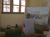 Paul Augustinus working of the Etosha painting in one of the rest camp bungalows at Okaukuejo in Etosha, Namibia