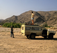 Clarissa and Paul Augustinus looking for a place to camp safely in the bed of the Hoanib River in Namibia