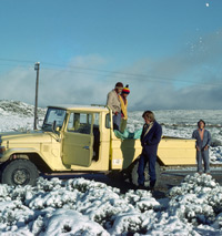 Paul Augustinus and some staff on a fresh Sutherland morning after a night of snow. The Karoo in South Africa, 1976