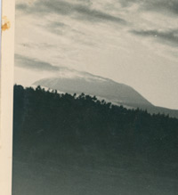 A black and white image of Kilimanjaro taken from the Arusha side of the border by Knud Dons Augustinus in 1950