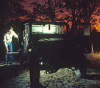 Paul Augustinus packs his Land Cruiser in the dark in order to make an early start in the Chobe National Park in Botswana
