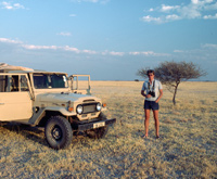 Paul Augustinus with his Land Cruiser out on the open plains of Nxai Pan in Botswana