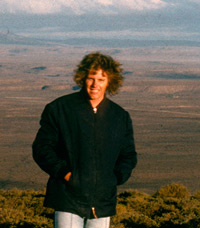 Paul Augustinus on a mountain overlooking the plains below in the Karoo in South Africa